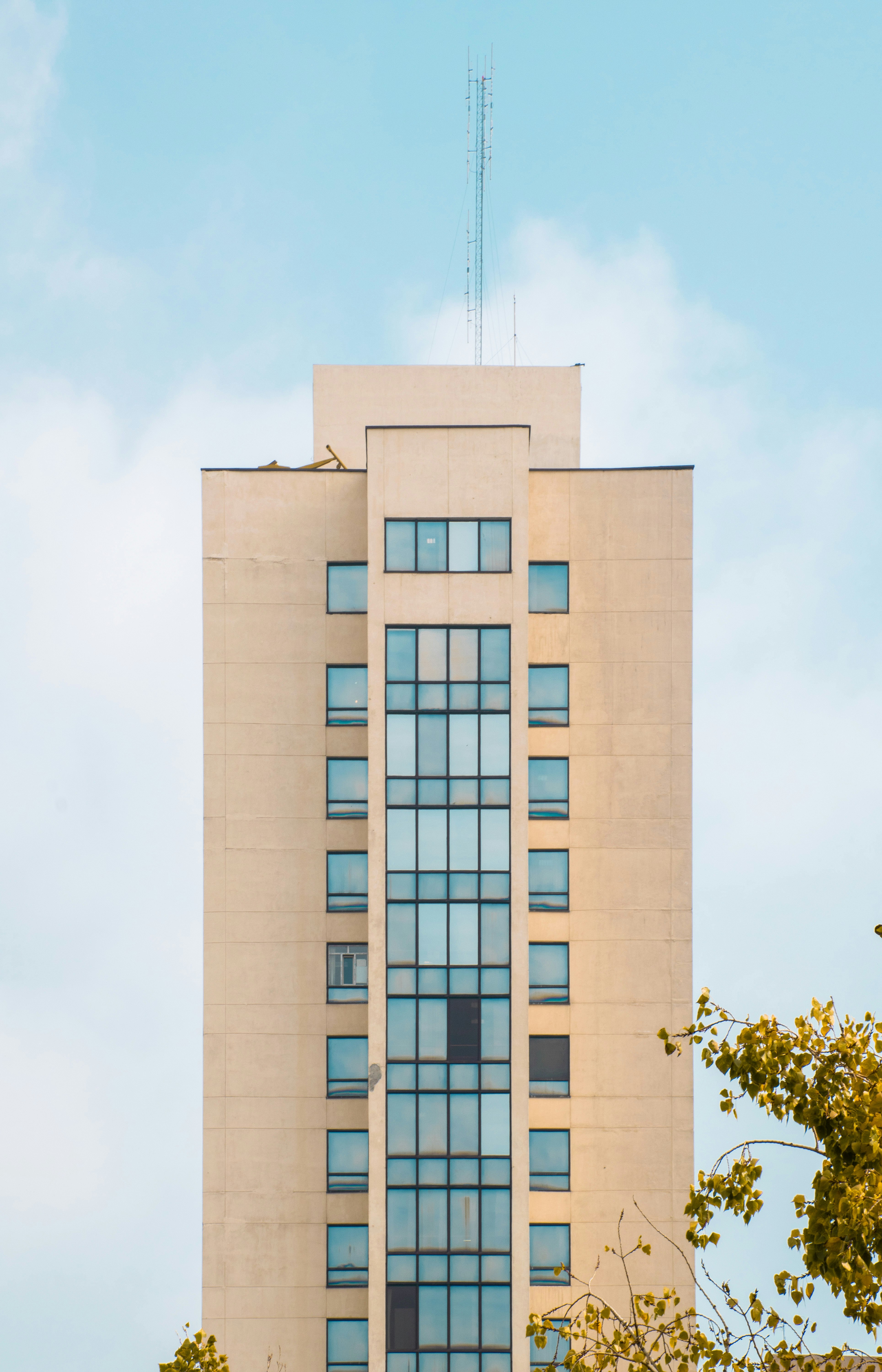 brown concrete building under blue sky during daytime